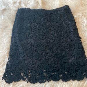 Black mini crochet lace skirt